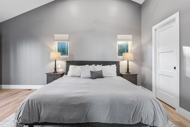 408 El Lobo Ln, Fairplay, CO 80440 - bedroom featuring light wood-type flooring and high vaulted ceiling