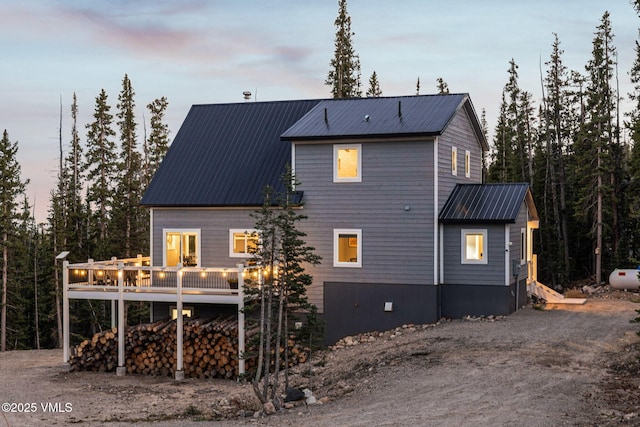 408 El Lobo Ln, Fairplay, CO 80440 - rear view of property featuring a metal roof and a wooden deck
