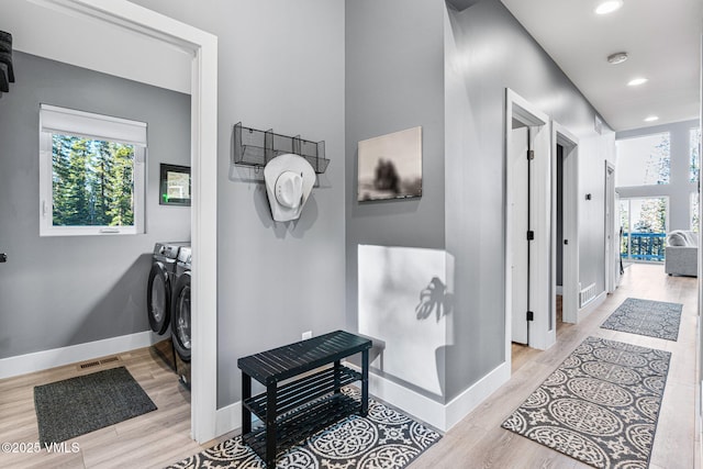408 El Lobo Ln, Fairplay, CO 80440 - corridor with washing machine and dryer, light wood-style flooring, and recessed lighting