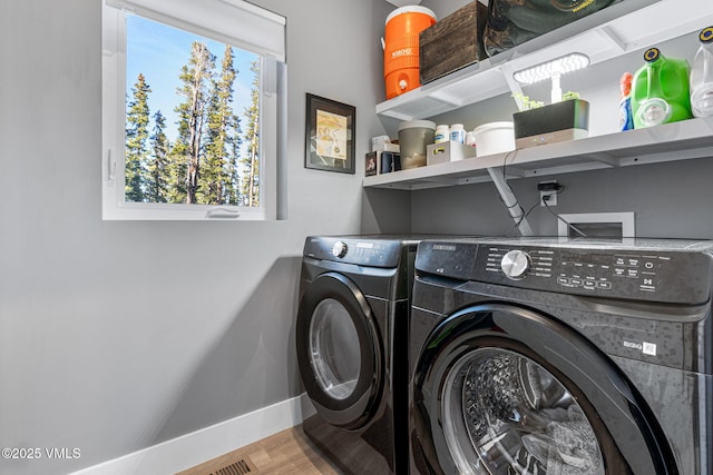 408 El Lobo Ln, Fairplay, CO 80440 - laundry area with separate washer and dryer and wood finished floors