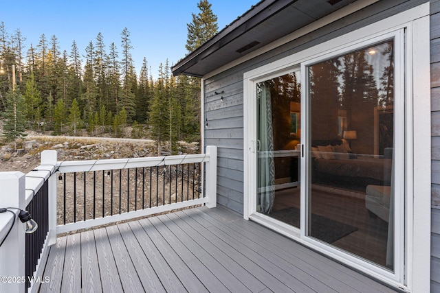408 El Lobo Ln, Fairplay, CO 80440 - wooden deck featuring a view of trees