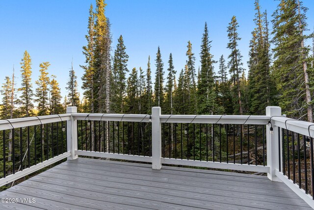 408 El Lobo Ln, Fairplay, CO 80440 - wooden deck with a wooded view