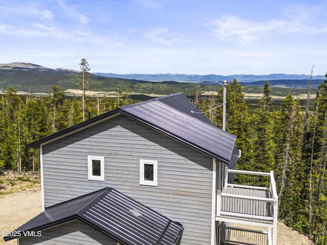 408 El Lobo Ln, Fairplay, CO 80440 - view of property exterior with a mountain view, a balcony, and a wooded view