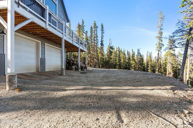 408 El Lobo Ln, Fairplay, CO 80440 - view of yard with driveway and an attached garage