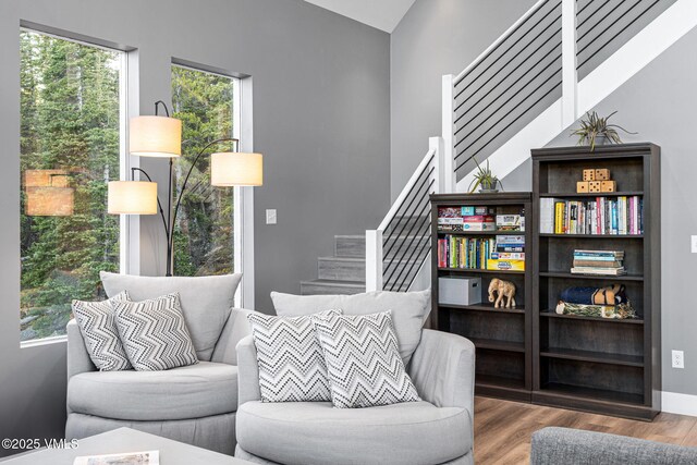 408 El Lobo Ln, Fairplay, CO 80440 - sitting room with stairway, wood finished floors, and healthy amount of natural light