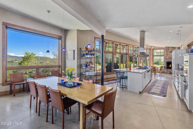 6306 Bellyache Ridge Rd, Wolcott, CO 81655 - dining space featuring recessed lighting and a stone fireplace