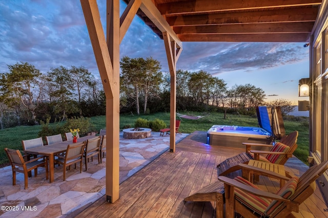 6306 Bellyache Ridge Rd, Wolcott, CO 81655 - wooden terrace with a covered hot tub, an outdoor fire pit, a patio area, and outdoor dining area