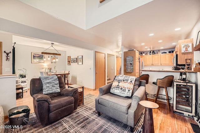 living room with wood-type flooring and wine cooler