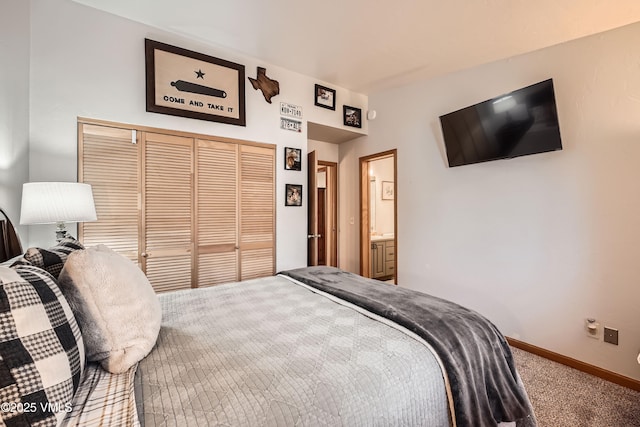 bedroom with carpet flooring and a closet