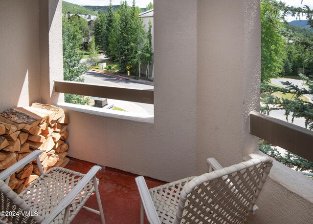 balcony featuring a mountain view