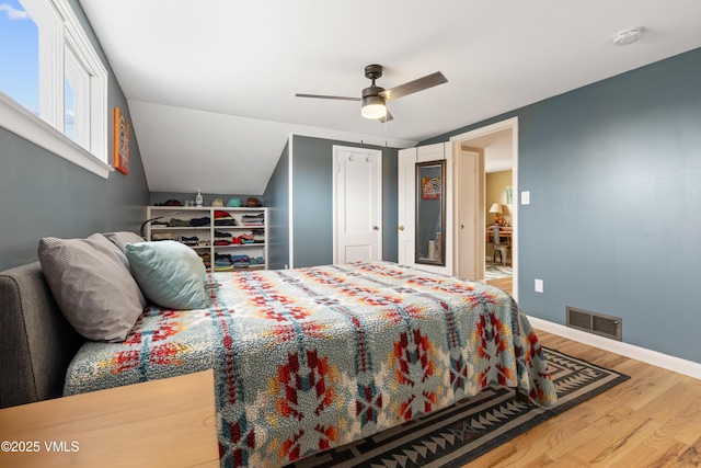 618 W Chestnut St, Leadville, CO 80461 - bedroom featuring wood finished floors, baseboards, ceiling fan, and lofted ceiling
