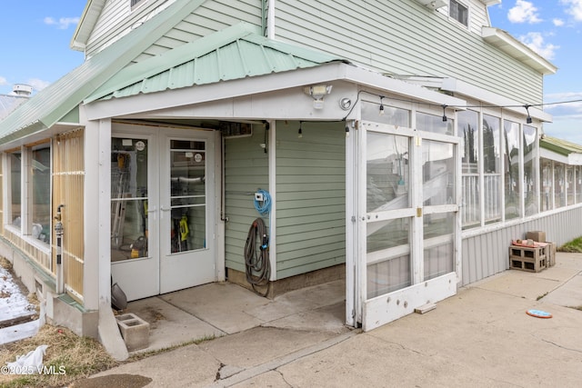 618 W Chestnut St, Leadville, CO 80461 - view of side of home with a sunroom, french doors, and a patio