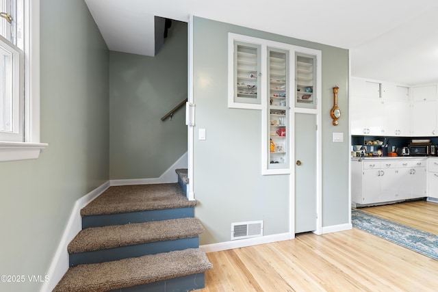 618 W Chestnut St, Leadville, CO 80461 - stairway featuring wood finished floors and baseboards