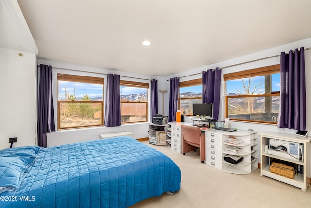 carpeted bedroom featuring recessed lighting