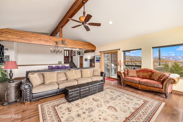 living area with stairs, ceiling fan with notable chandelier, beam ceiling, and hardwood / wood-style flooring