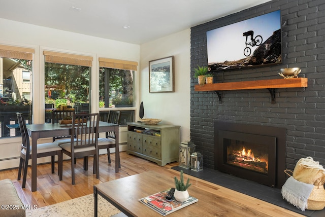 909 Red Sandstone Rd Unit B2, Vail, CO 81657 - living area featuring wood finished floors and a fireplace