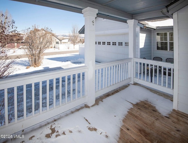 view of snow covered patio