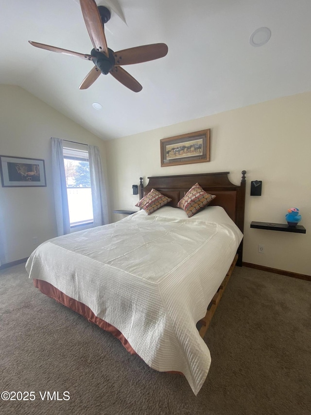 bedroom featuring ceiling fan, lofted ceiling, and dark carpet