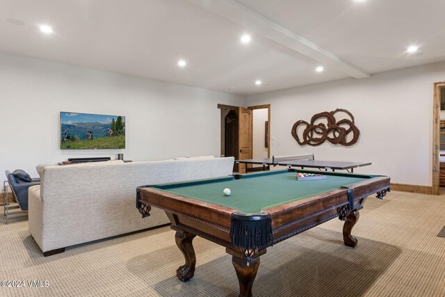 game room with billiards, beam ceiling, and light carpet