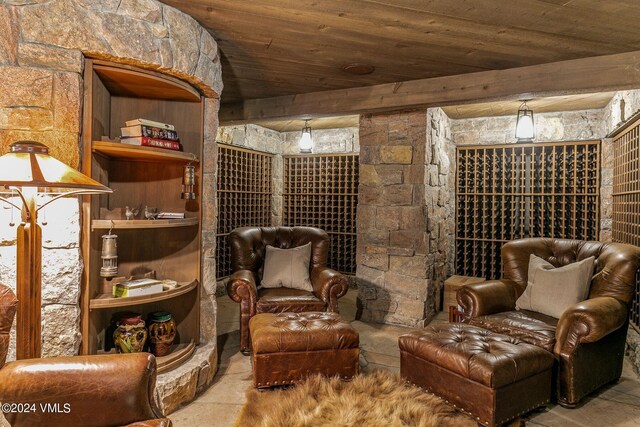 wine area featuring wooden ceiling