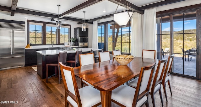 367 Hunters View Ln, Eagle, CO 81631 - dining space with dark wood-style flooring, healthy amount of natural light, and beamed ceiling