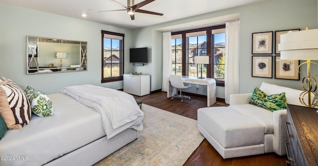 367 Hunters View Ln, Eagle, CO 81631 - bedroom with wood finished floors, multiple windows, an office area, baseboards, and recessed lighting