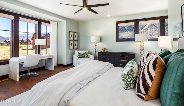 367 Hunters View Ln, Eagle, CO 81631 - bedroom with wood finished floors, a desk, baseboards, and ceiling fan