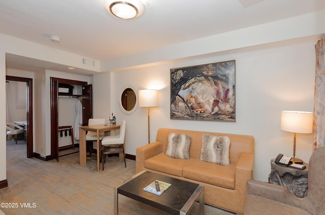 26 Avondale Ln Unit 502-H, Beaver Creek, CO 81620 - carpeted living area featuring baseboards