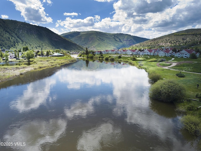 1404 Crazy Horse Cir Unit 1404, Edwards, CO 81632 - water view featuring a mountain backdrop