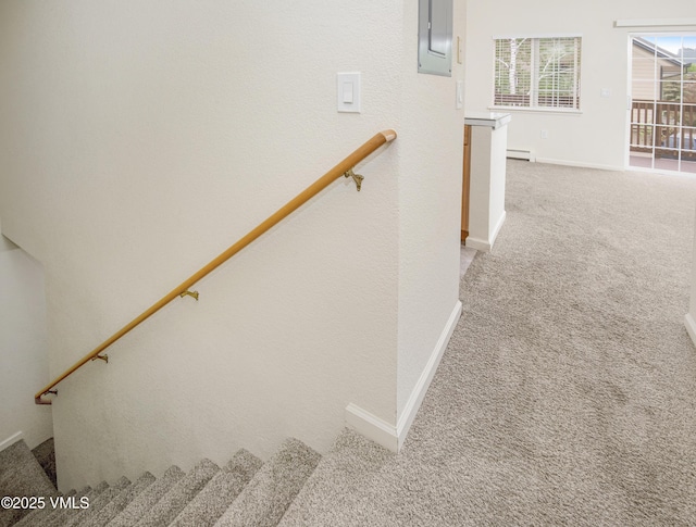 1404 Crazy Horse Cir Unit 1404, Edwards, CO 81632 - stairway featuring carpet, electric panel, a baseboard heating unit, and baseboards