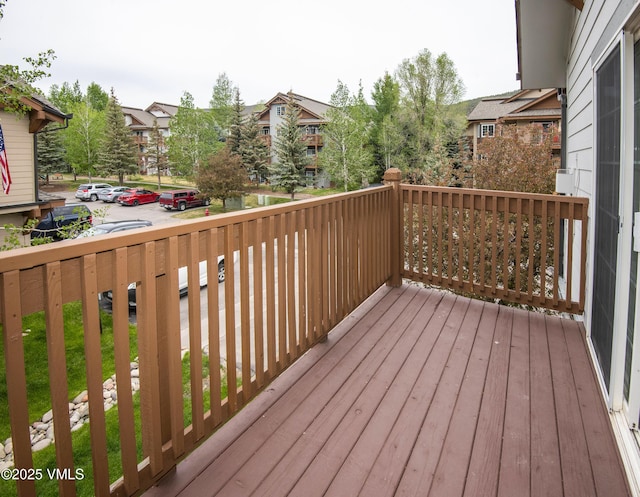 1404 Crazy Horse Cir Unit 1404, Edwards, CO 81632 - wooden terrace featuring a residential view