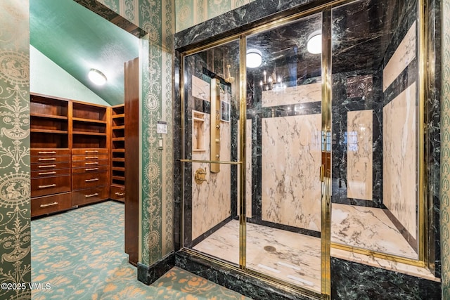 wine room with lofted ceiling