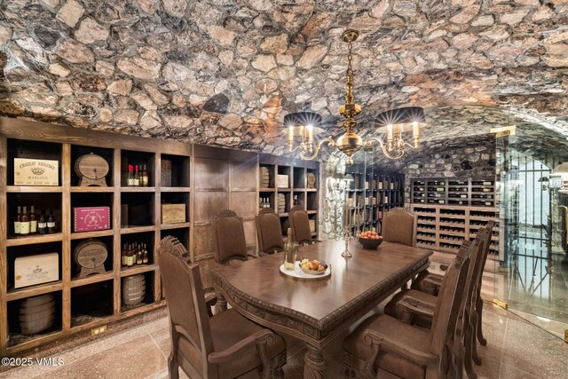 wine cellar featuring an inviting chandelier