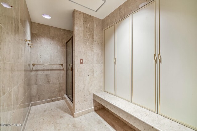 bathroom with a stall shower