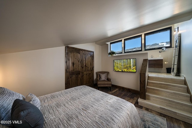 508 E Lionshead Cir Unit 502, Vail, CO 81657 - bedroom with wood finished floors and baseboards