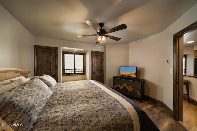 508 E Lionshead Cir Unit 502, Vail, CO 81657 - bedroom featuring dark wood-style floors and ceiling fan