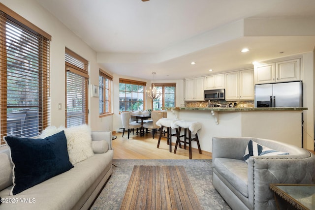 627 Sawatch Dr Unit 302, Edwards, CO 81632 - living area featuring light wood-style floors and recessed lighting