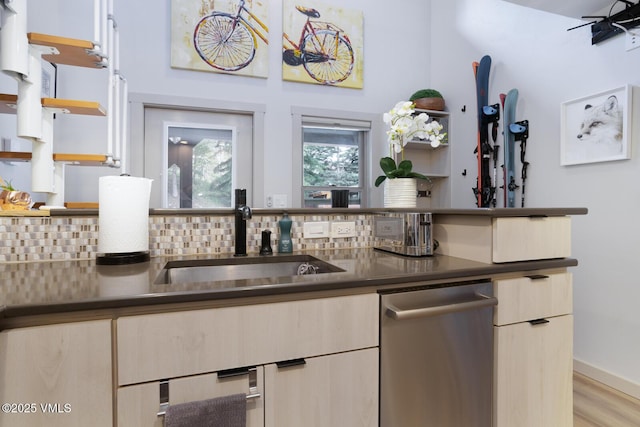 1552 Matterhorn Cir Unit 9, Vail, CO 81657 - kitchen featuring open shelves, a sink, dark countertops, dishwasher, and tasteful backsplash
