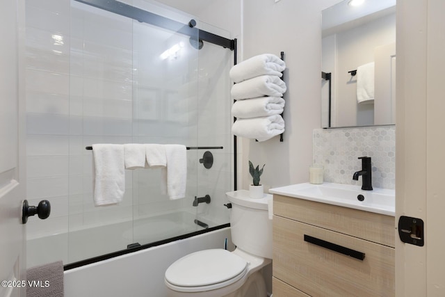 1552 Matterhorn Cir Unit 9, Vail, CO 81657 - full bathroom with enclosed tub / shower combo, toilet, tasteful backsplash, and vanity