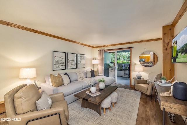 9 Vail Rd Unit 1J, Vail, CO 81657 - living room featuring wood finished floors and ornamental molding