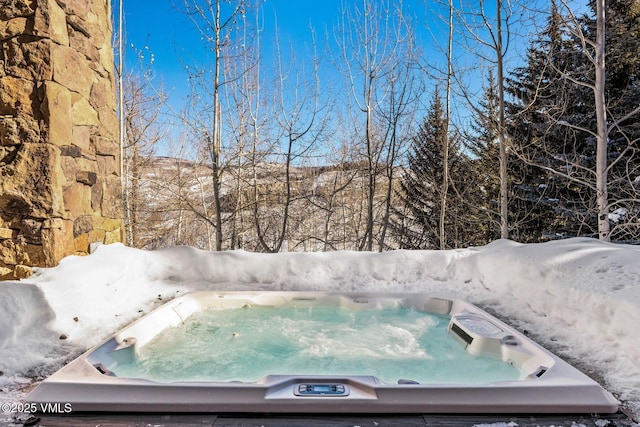 exterior details featuring a jacuzzi