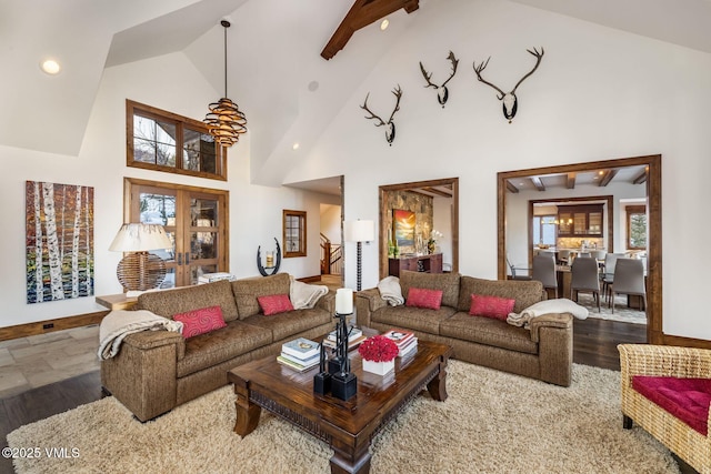 living room featuring french doors, high vaulted ceiling, beam ceiling, and hardwood / wood-style floors