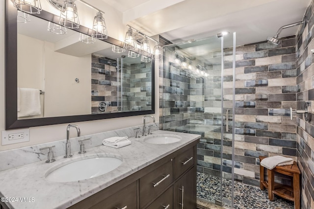 bathroom with vanity and walk in shower