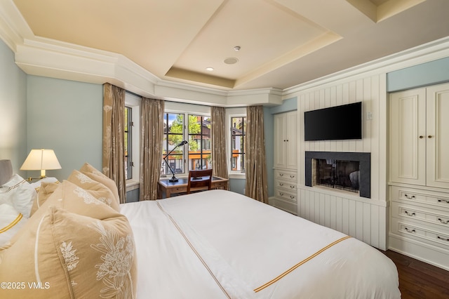 1 Willow Bridge Rd Unit 36, Vail, CO 81657 - bedroom featuring a raised ceiling, dark wood finished floors, a fireplace, and access to outside