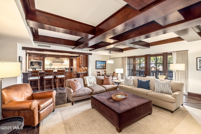 1 Willow Bridge Rd Unit 36, Vail, CO 81657 - living room featuring beam ceiling and light wood finished floors