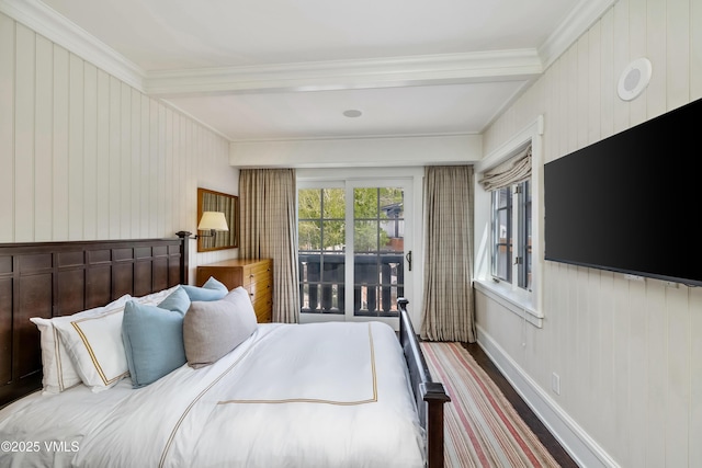 1 Willow Bridge Rd Unit 36, Vail, CO 81657 - carpeted bedroom with crown molding, wooden walls, and baseboards
