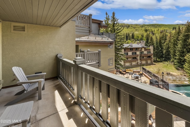 1 Willow Bridge Rd Unit 36, Vail, CO 81657 - balcony featuring a wooded view