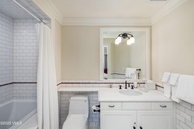 1 Willow Bridge Rd Unit 36, Vail, CO 81657 - full bath with vanity, toilet, shower / bath combination with curtain, crown molding, and wainscoting