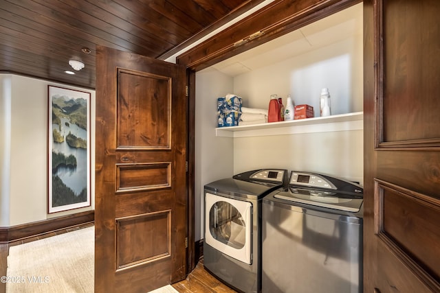 1 Willow Bridge Rd Unit 36, Vail, CO 81657 - washroom with independent washer and dryer, wooden ceiling, and wood finished floors