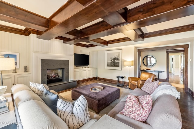 1 Willow Bridge Rd Unit 36, Vail, CO 81657 - living area featuring baseboards, wood finished floors, beamed ceiling, a fireplace with raised hearth, and coffered ceiling